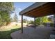 Backyard patio featuring a built-in grill, fire pit, and outdoor seating, ideal for relaxation at 7600 S Ulster Ct, Centennial, CO 80112