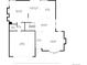 Detailed floor plan showcases the layout of the home, including the kitchen, living room, and garage at 7600 S Ulster Ct, Centennial, CO 80112