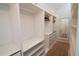 Spacious walk-in closet with custom shelving, drawers, and ample storage space for an organized wardrobe at 7600 S Ulster Ct, Centennial, CO 80112