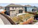 Aerial view of backyard featuring privacy fence and patio at 1624 Pinion Wing Cir, Castle Rock, CO 80108