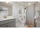 Cozy bathroom with shower and tub combo adjacent to a sink and commode at 1624 Pinion Wing Cir, Castle Rock, CO 80108