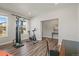 Versatile exercise room with natural light, providing the perfect space for workouts and maintaining a healthy lifestyle at 1624 Pinion Wing Cir, Castle Rock, CO 80108
