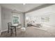 Spacious bedroom with large windows and attached office space at 1624 Pinion Wing Cir, Castle Rock, CO 80108