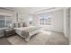 Tranquil main bedroom with plenty of natural light and neutral tones, creating a peaceful and restful retreat at 1624 Pinion Wing Cir, Castle Rock, CO 80108