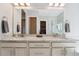 Elegant bathroom with double vanity and granite countertop at 26642 E Peakview Pl, Aurora, CO 80016