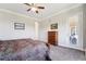 Spacious bedroom with carpet flooring and large window at 26642 E Peakview Pl, Aurora, CO 80016