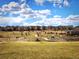 Scenic community park with playground, walking paths, and open space at 26642 E Peakview Pl, Aurora, CO 80016