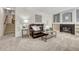 Cozy living room features a fireplace and built-in shelving at 11299 Glenmoor Cir, Parker, CO 80138