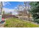 Fenced backyard with a lawn at 2675 S Deframe Cir, Lakewood, CO 80228