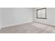 Bedroom with neutral carpet and a window at 2675 S Deframe Cir, Lakewood, CO 80228