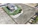 The aerial view showcases the backyard with patio seating, fire pit, and plenty of yard space at 12701 Strawberry Cir, Longmont, CO 80503
