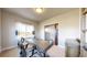Comfortable office space featuring a wooden desk and chair, with a view from the window at 12701 Strawberry Cir, Longmont, CO 80503