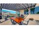 Outdoor patio with a pergola, grill, dining table, chairs, and a view of the backyard at 12701 Strawberry Cir, Longmont, CO 80503