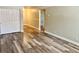 Bright living room boasts wood floors, white trim, and neutral paint for a modern, airy feel at 1390 Emerson St # 107, Denver, CO 80218