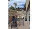 Cozy patio with a stone wall, outdoor seating, and a pergola, perfect for relaxing or entertaining at 1390 Emerson St # 107, Denver, CO 80218