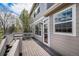 Relaxing deck with house siding, railing, and an exterior door at 11788 Mill Valley St, Parker, CO 80138