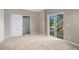 Bedroom with closet and sliding glass doors to a patio at 11788 Mill Valley St, Parker, CO 80138