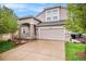 Charming two-story home features a stone accent porch and a spacious two-car garage at 11788 Mill Valley St, Parker, CO 80138