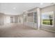 Large room with built-in cabinets, shelves, and plenty of natural light at 11788 Mill Valley St, Parker, CO 80138