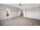 Large primary bedroom featuring carpet, walk-in closet and 5-piece bathroom access at 11788 Mill Valley St, Parker, CO 80138