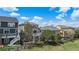 Rear exterior view of homes with two decks at 11788 Mill Valley St, Parker, CO 80138
