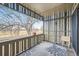Cozy balcony with a decorative rug and a view of the green outdoors at 2525 S Dayton Way # 1003, Denver, CO 80231