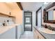 Bathroom features sink and washer and dryer at 2525 S Dayton Way # 1003, Denver, CO 80231