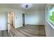 Spacious bedroom featuring contemporary ceiling fan, ample closet space, and modern flooring at 2218 Coronado N Pkwy # B, Denver, CO 80229