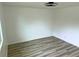 A bedroom with plank flooring and a ceiling fan at 2218 Coronado N Pkwy # B, Denver, CO 80229