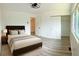 Bright bedroom with generous closet space, neutral decor, and lots of natural light at 2218 Coronado N Pkwy # B, Denver, CO 80229