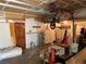 View of garage with storage, overhead light, and various contents at 2218 Coronado N Pkwy # B, Denver, CO 80229