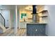 Bright kitchen featuring stainless steel appliances, light cabinets and attractive floors at 2218 Coronado N Pkwy # B, Denver, CO 80229