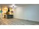 Open living space with sleek floors and easy access to the modern kitchen at 2218 Coronado N Pkwy # B, Denver, CO 80229