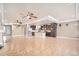 Open concept kitchen and living area featuring modern appliances and fixtures at 5521 Ensenada St, Denver, CO 80249