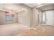 Open living space features tray ceilings, neutral paint, and abundant natural light at 5521 Ensenada St, Denver, CO 80249