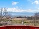 This property has gorgeous mountain views from the balcony with open land and city views at 43 Falcon Hills Dr, Highlands Ranch, CO 80126