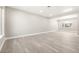 Spacious open living area with modern flooring and neutral wall paint ready for personalization and decor at 1269 N Revere St, Aurora, CO 80011