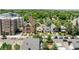 Aerial view of the street showing the house nestled in a beautiful neighborhood with local businesses at 3259 Lowell Blvd, Denver, CO 80211