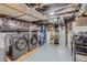 Functional laundry area in the basement featuring a modern washer and dryer, as well as additional storage at 3259 Lowell Blvd, Denver, CO 80211