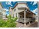Lovely backyard porch perfect for entertaining and relaxing outdoors at 9723 Bennett Peak St, Littleton, CO 80125