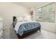 Cozy bedroom with natural light and serene ambiance for relaxation and restful nights at 9723 Bennett Peak St, Littleton, CO 80125