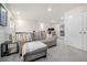 Comfortable living area with a gray sofa, soft carpet, and an open floor plan at 9723 Bennett Peak St, Littleton, CO 80125