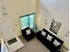 Bright open living space with high ceilings, neutral tones, and plenty of natural light at 19102 E Hampden Dr, Aurora, CO 80013