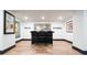 Basement bar with modern stools, mirror, and stylish decor for entertaining guests at 3309 E 7Th Ave Pkwy, Denver, CO 80206