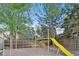 Backyard play structure with slide and monkey bars for Gathering fun at 504 E Otero Ct, Littleton, CO 80122