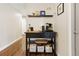 Coffee bar area featuring a black stand with storage and decor accents at 504 E Otero Ct, Littleton, CO 80122