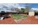 The backyard is fully fenced and includes a shed, deck, trampoline, pergola and a lawn at 7620 Hooker St, Westminster, CO 80030