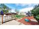 Well-maintained backyard with a deck, grassy area, and play structures, ideal for Gathering fun and outdoor activities at 7620 Hooker St, Westminster, CO 80030