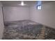 Unfinished basement space featuring bare floor, white walls, and a small window at 7620 Hooker St, Westminster, CO 80030