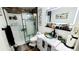 Stylish bathroom showcasing modern fixtures, glass vessel sink, a sleek shower, and contemporary design at 7620 Hooker St, Westminster, CO 80030
